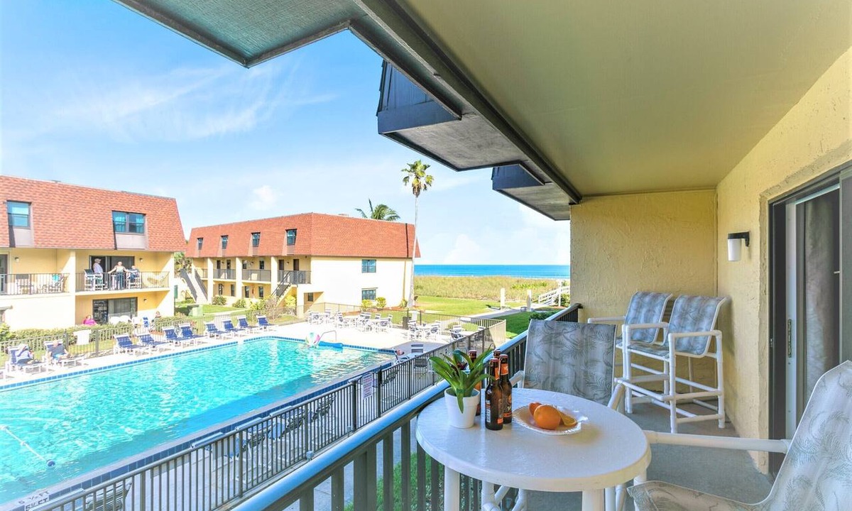 Avon By The Sea Condo | 🌴Beachfront Family Retreat: Pool, Private Balcony & Walk to the Pier