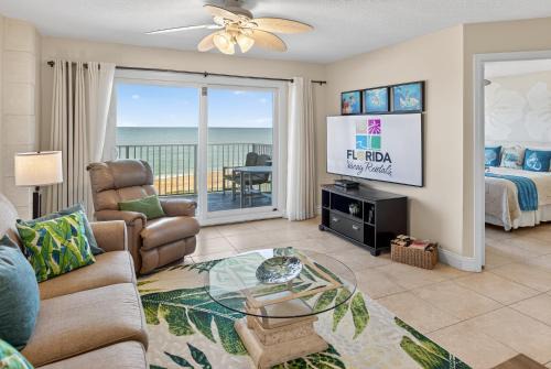 Seawinds Condo Apartment | Direct oceanfront 2/2 condo with a private balcony, heated beachfront pool, and garage