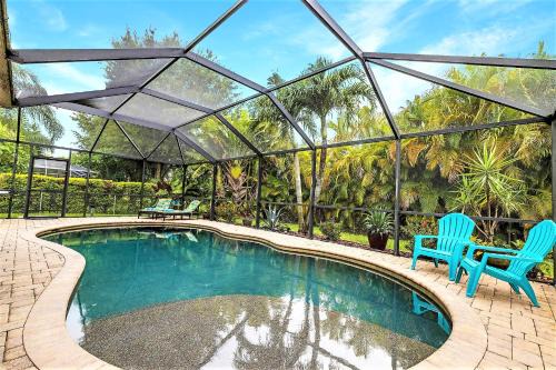 Pelican Villa | Family friendly 4BR villa with bikes & heated pool! Villa Rita's Dream - SWFL Rentals