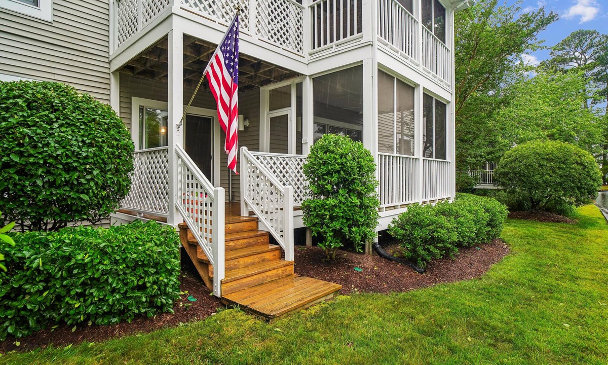 Bethany Beach Condo | Free Golf at Bear Trap Dunes and MORE! 2 Bedroom 2 bath. first floor Sea Colony West unit with a beautiful view of the lake.