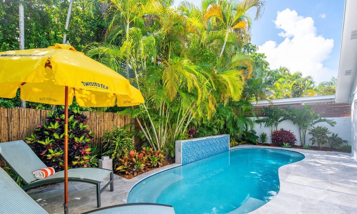 Midtown House | Island Time on Washington : Stylish 4BR Key West Home, Heated Pool, Dogs OK, Parking & Near Beaches