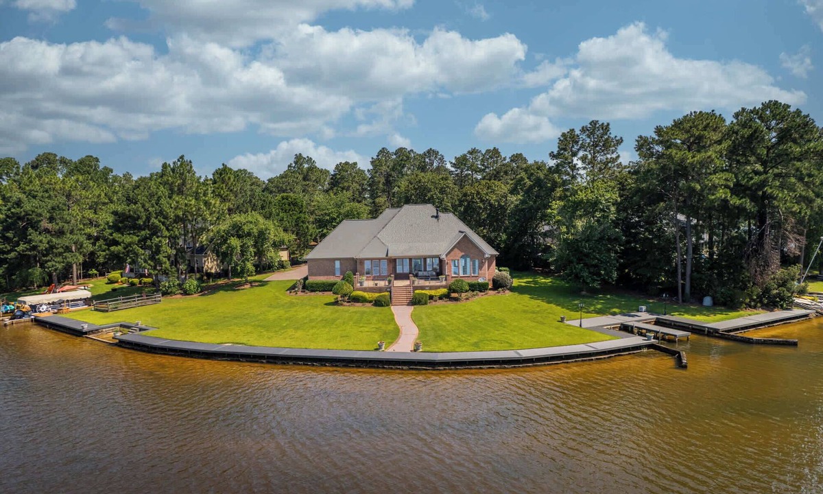 Olivia House | Lakefront Family Retreat with Game Room Fun