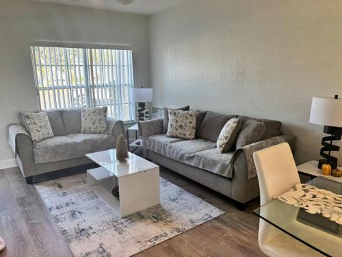 Sabal Harbour Villa | Modern townhouse, with two master suites in a gated community, tennis courts, basketball courts, huge swimming pool and playground