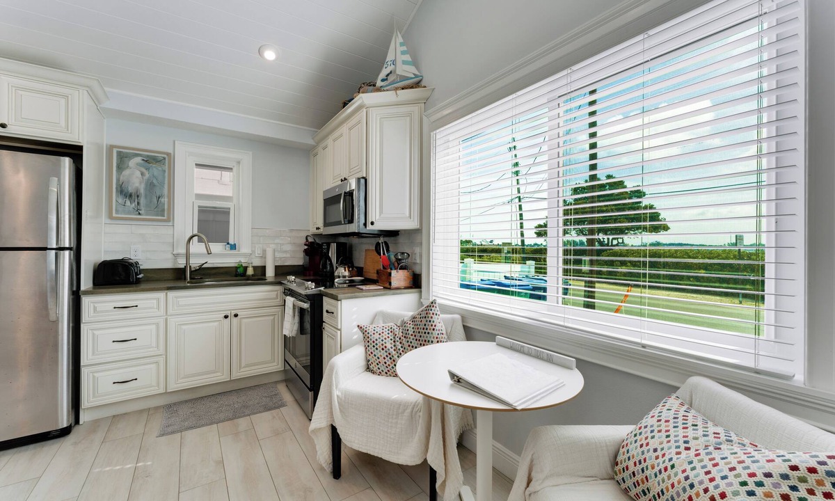Bradenton Beach Cottage | NEW LISTING. High Tide—- Beach and Bay just steps away!