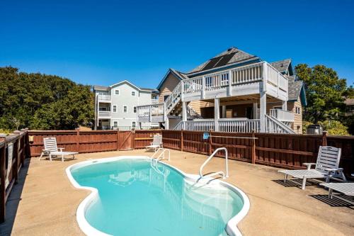 Whalehead Beach House | Pet Friendly Coastal Cottage in Corolla, North Carolina, Complete with Outdoor Pool and Private Hot Tub