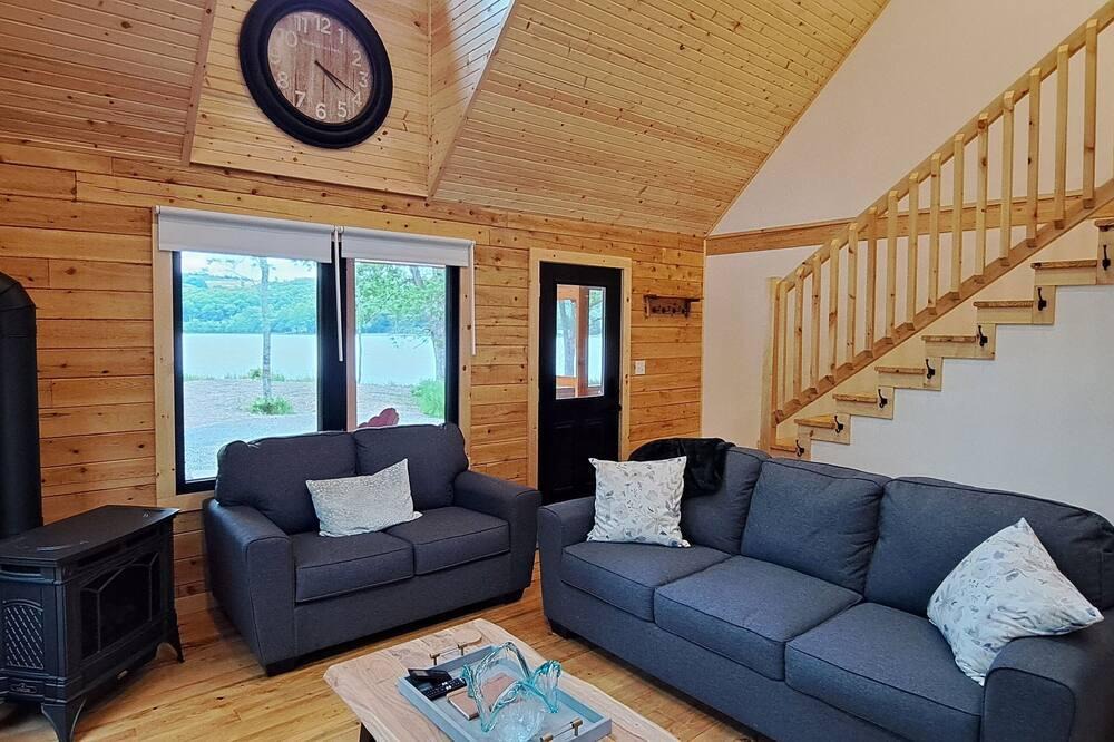 Antigonish County Cabin | Private lakefront log cabin with year-round hot tub.