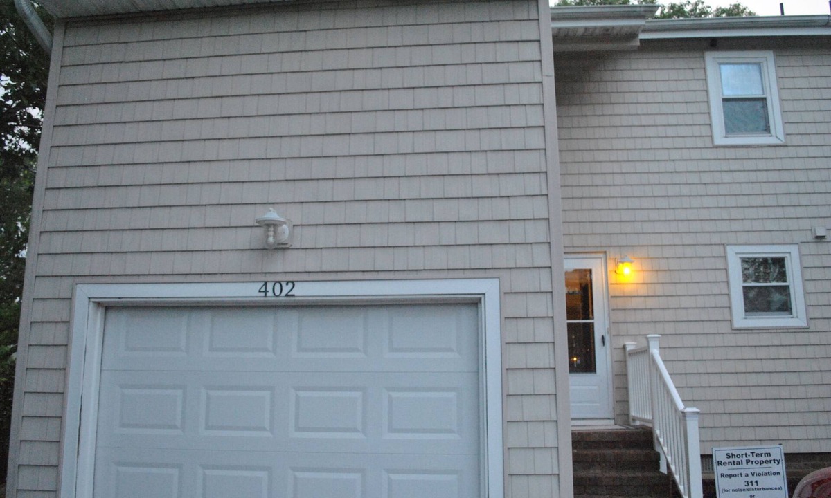 Croatan Beach House | Sat-Sat rental. A stunning view of Lake Christine & short walk to Croatan beach!