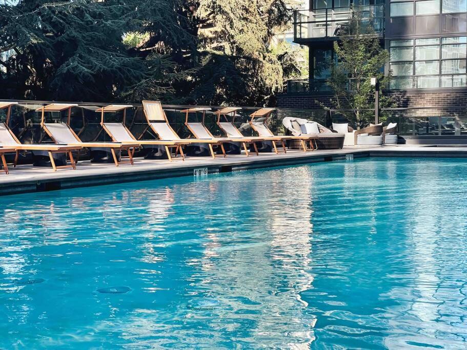 South Lake Union Apartment | Second House Boren-Come Relax by the Pool or Unwind in the Sauna!