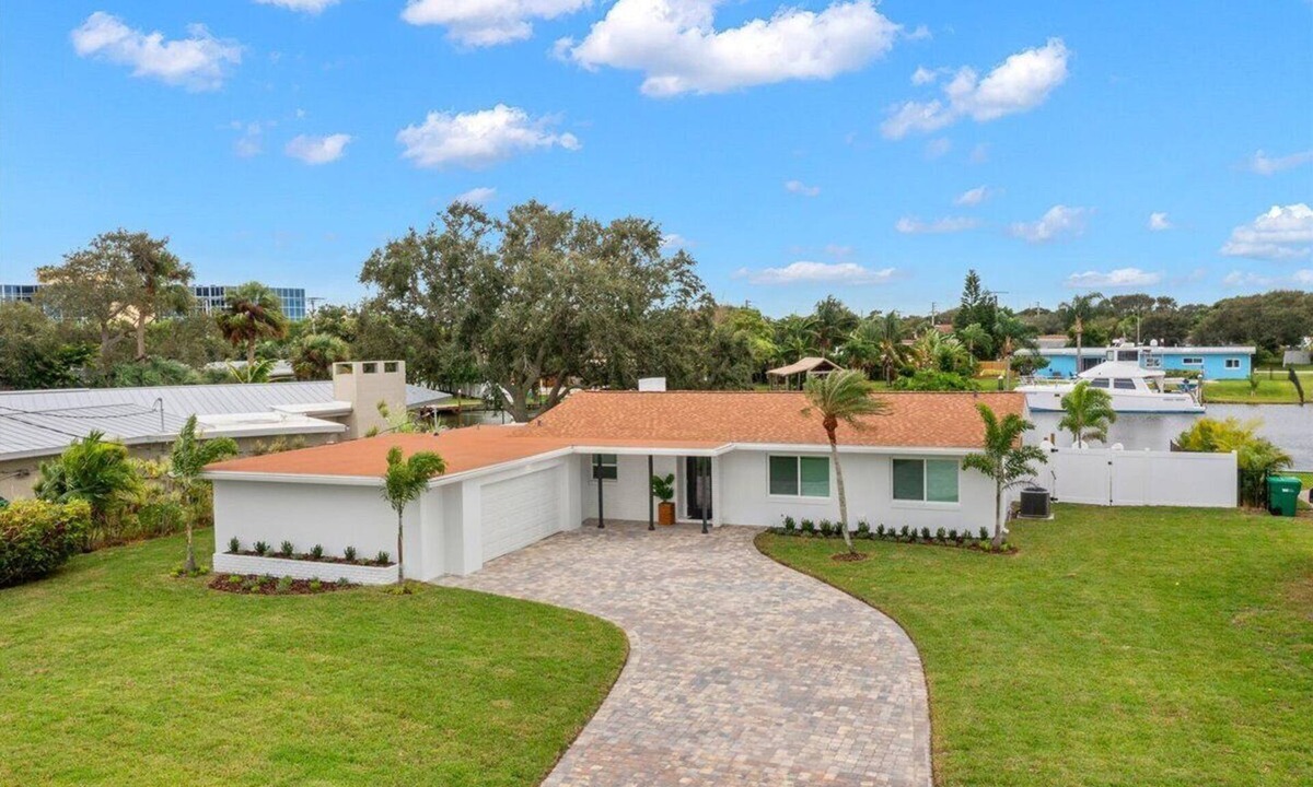 Cocoa Isles House | Walk to beach, riverfront, pool home. Bring your boat!