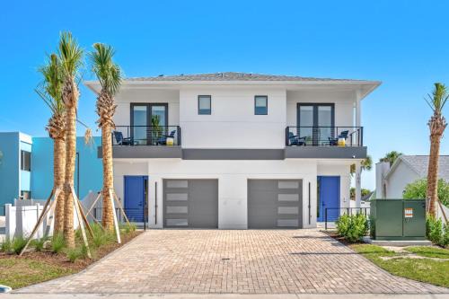 Cocoa Beach Villa | Wave Haven - 4 Luxury Units - 10BR 12BA Total - Sleeps 6 or 8 Per Unit - Hot Tub - Across from Beach - Rocket and Beach Views