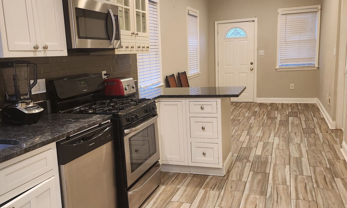 West Baltimore House | whole 3-bedroom townhome in welcoming Baltimore with AC and charm