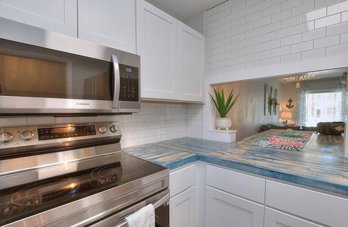 Caswell Beach Condo | 2 BR/2 BA Condo - Pool & Beach, Golf Course Across the Street, Sleeps 6