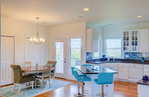 Village of Stump Sound House | 2nd-row ocean-view home with elevator, cmty pool & tennis