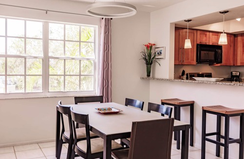 Siesta Key Condo | 2nd story end unit with no one above offers light and calm and all the comfort you can hope for !