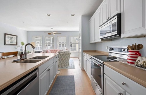 Sunset Island Villa | 5BR Sunset Island Gem - Luxe Pools, Beaches, Fitness Center & Crabbing Pier