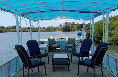 Osprey House | 70-Foot Houseboat, Secluded Beach, Onsite Bikes & Golf carts to tour the Key!