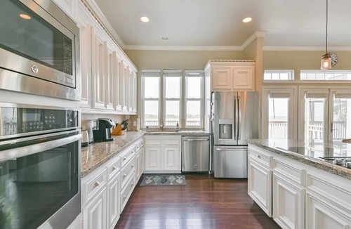 Isla Del Sol House | Bayfront home 4 large bedrooms with sunrise and sunset over the water