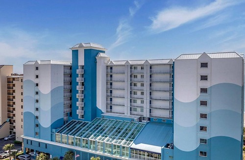 Windy Hill Condo | Beach themed 1BD condo with resort amenities including lazy river