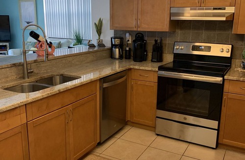 Redington Beach Condo | Beachfront - Steps to the Ocean & Private Pool.