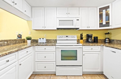Avon By The Sea Condo | Beautiful ground floor condo. Steps to the heated pool, BBQ grills, and beach! ☀️