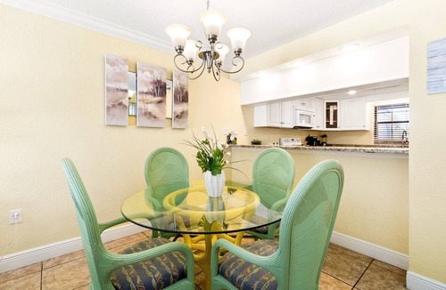 Avon By The Sea Condo | Beautiful ground floor condo. Steps to the heated pool, BBQ grills, and beach! ☀️