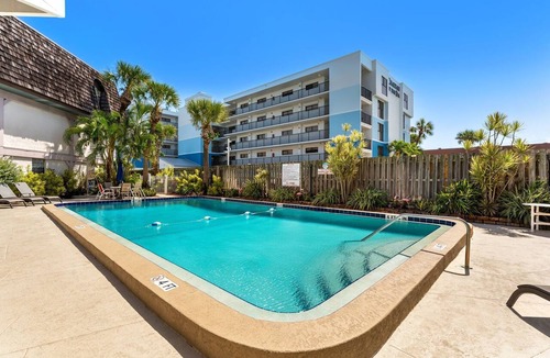 Avon By The Sea Condo | Beautiful ground floor condo. Steps to the heated pool, BBQ grills, and beach! ☀️