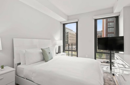 NoMa House | Brand New NoMa 2BR | Gym & Rooftop | 1 block from Metro