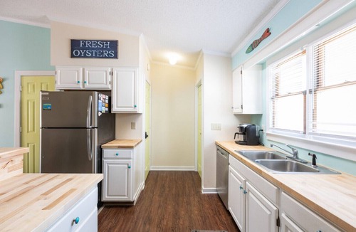 Kitty Hawk Villa | Bright Coastal Townhome | Steps to Beach | Pool, Bikes & More