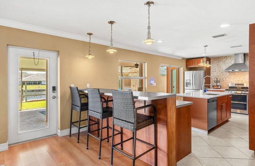 Holiday Cove House | Canal-Front 5BR Home with Pool Near Port Canaveral and Kennedy Space Center