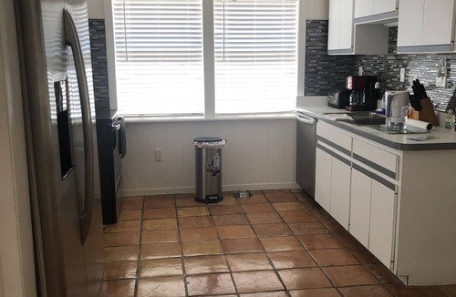 Longbeach Village Cottage | Canal front cottage, walking distance to sandy Gulf