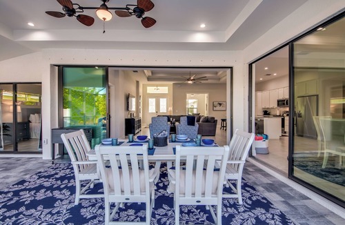 Pelican Villa | Cape Paradise - Magnificent 4 BR Villa with heated saltwater pool, kayaks, bikes, and fishing poles