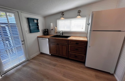 Bradenton Beach Cottage | Charming 1920s Cottage, Waterfront just 50 ft away, Beach just 1 minute stroll!