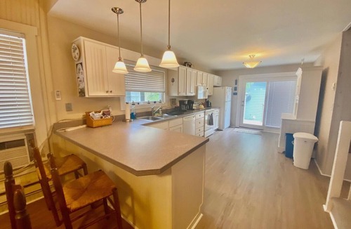 The Pines Cottage | Charming Rehoboth Beach Cottage with Wraparound Porch, Grill, & Separate Cottage