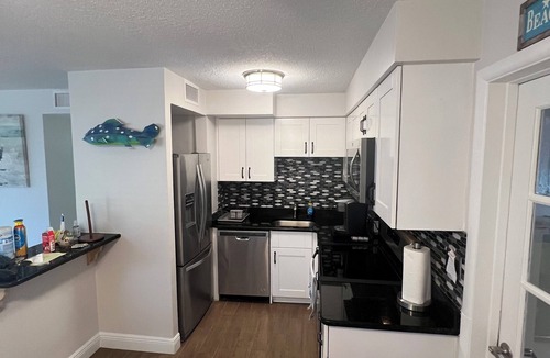 Cocoa Isles House | Coastal 3 Bedroom, heated pool, walk to the beach and restaurants