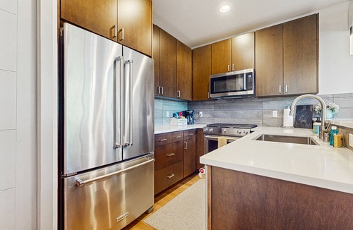 Crown Hill House | Colorful luxury home with rooftop patio & BBQ grill, board games, & more!