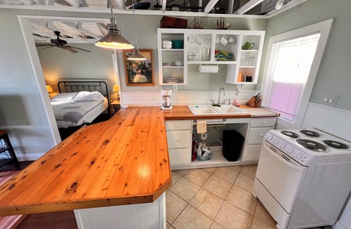 Bradenton Beach Cottage | Cottage B at Historic Waterfront Fish Camp. Private dock- 1 minute walk to beach