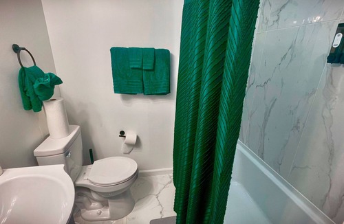 Landover Apartment | Cozy Private King Suite & Patio Wash Driveway walk 2 Stadium