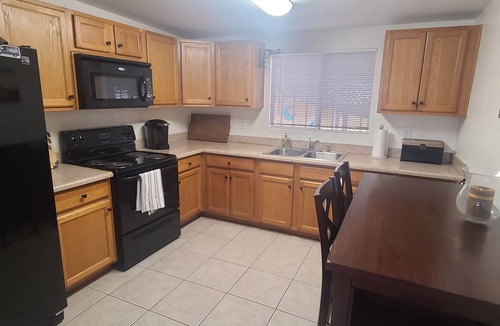 Apache Junction House | Cozy spanish style bungalow; huge private covered patio includes spa and more!