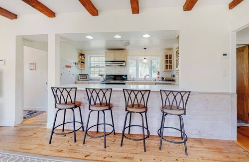 Jamaica House | Delightful updated farmhouse with original features, patio, and & W/D