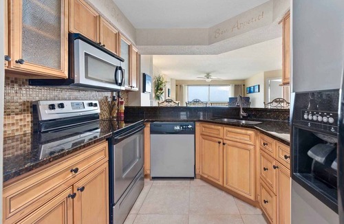 Seawinds Condo Condo | Direct oceanfront 2/2 condo with a private balcony, heated beachfront pool, and garage