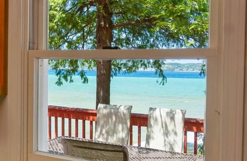 Suttons Bay Cottage | Directly on Suttons Bay with central air