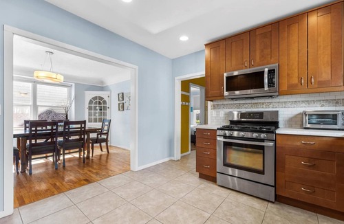 North End House | DOG FRIENDLY & EPIC Location! Walk 2 Blocks to Hyde Park | Cozy Up by the Fireplace!