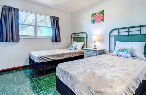 Rockledge House | Dog-friendly home with a pool, AC, grill, firepit, large yard & W/D