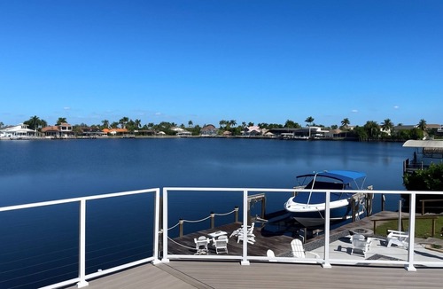 Eight Lakes Villa | Dolphin Cove Villa Gulf Access Waterfront Heated Pool & Hot Tub Game Room