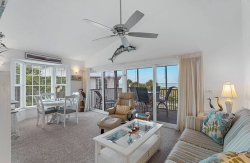 Palm Island Villa | Enjoy a Beautiful Gulf Sunset from the Screened Porch on Resort Villa A3221B
