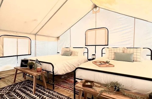 Osprey RV Rental | Enjoyable Secluded Tented Cabin with Fire Pit in Sarasota, Florida