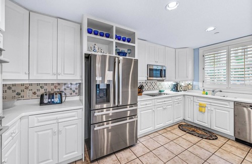 Downtown Boca Grande Historic District House | Experience luxury at B-505 Buttonwood, a spacious 4-bedroom, 3-bathroom home in Boca Bay