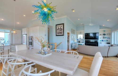 Caswell Beach House | Experience ocean views at 'West with the Night' in Oak Island, perfect for families.