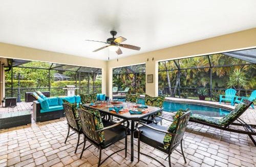 Pelican Villa | Family friendly 4BR villa with bikes & heated pool! Villa Rita's Dream - SWFL Rentals
