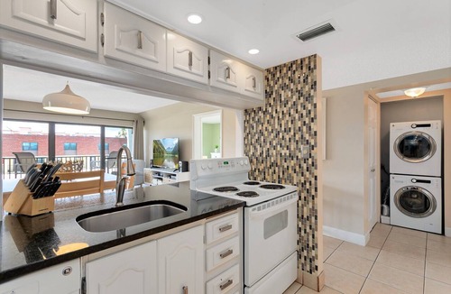 Avon By The Sea Condo | Family Friendly Beachfront Retreat Next to Cocoa Beach Pier with Heated Pool
